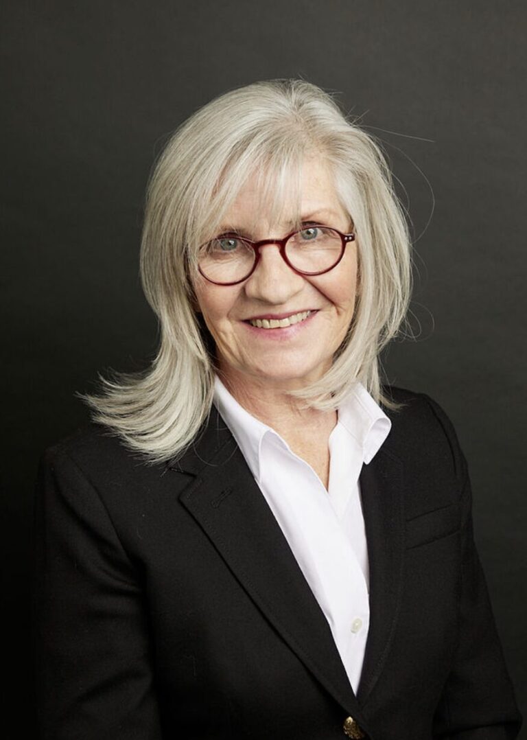 Lawyer Carolyn Kelly headshot wearing a suit